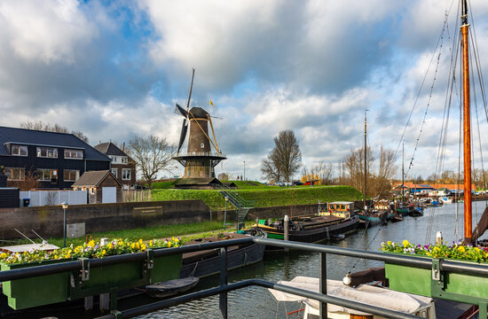 Historical dutch windmill named "Nooit Volmaakt" in the city of Gorinchem, Province South Holland