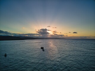 Obraz premium sunset at sea, sunset, boats