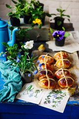 Floral hot cross buns.traditional easter pastries.
