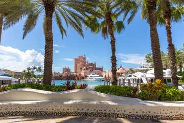 Beautiful view of Bahamas with yacht, palms and luxury hotel