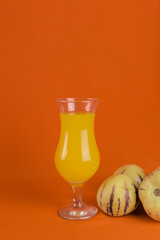 tropical fruits to prepare a natural juice. glass of juice with fruits