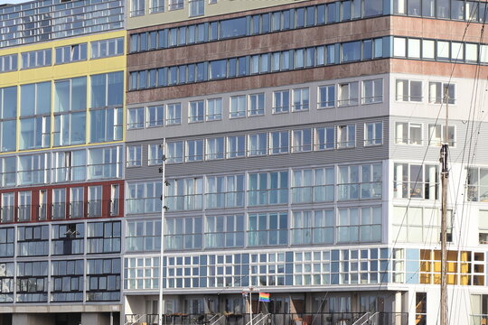 Amsterdam Houthaven District Modern Apartments Building Facade Close Up with Rainbow Flag, Netherlands