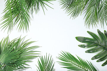 Summer composition, Abstract background with tropical palm leaves on sunny table, summer holiday...