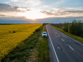 car parked at roadside of speedway