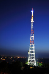 Television tower in the city of Lviv at night