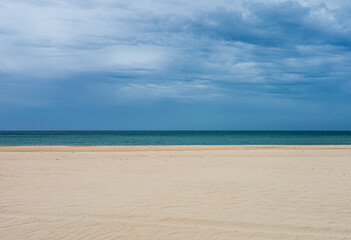 Sand, sea and sky in Cadiz, Spain.