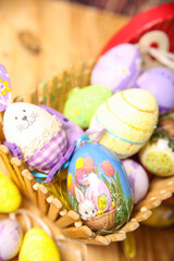 Fototapeta na wymiar patterned Easter eggs in a basket. Easter decoration