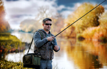 Fisherman angling on the river. Sport and recreation concept