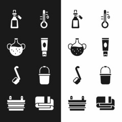 Set Cream or lotion cosmetic tube, Essential oil bottle, Sauna thermometer, ladle, bucket, Towel stack and icon. Vector