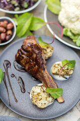 Grilled Veal or Lamb Chop with Roasted Cauliflower and Brown Sauce