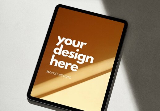 Tablet Mockup on a Grey Surface with Shadows