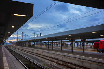 Platform, rails and locomotives on a train station