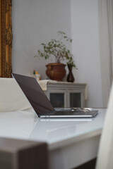  Macbook pro from home space on white table