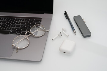  Macbook pro and work accessories on white background