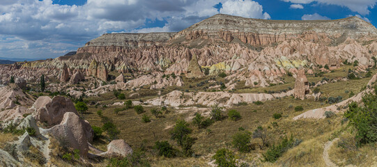Rock formations (Fairy Chimneys) of the Rose valley in Cappadocia, Turkey