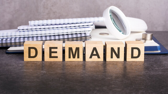demand word written on wood block, business concept. stock photo