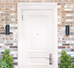 White simple wooden door , front view of a white front door