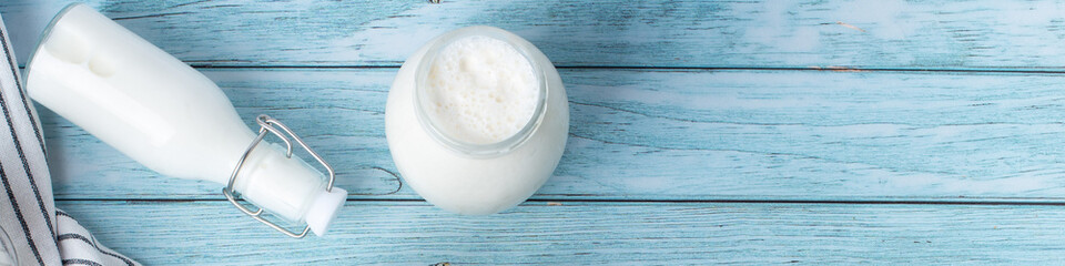 dairy products on a blue background. panorama