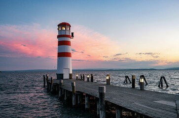 Sunset at the lake with a lighthouse