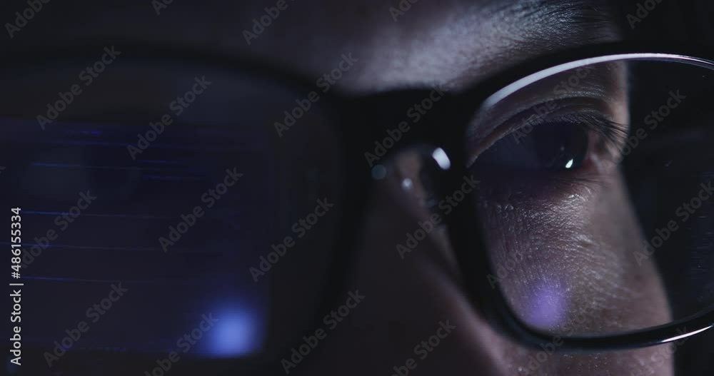 Fototapete 4K Video Close up macro asian eye with eyeglass with coding reflection. Concept for coding and programming.