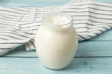 cream on a blue background. milk products