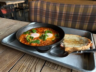 Shakshuka in a pan and toast