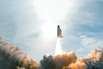The launch of the space shuttle. With fire and smoke. Elements of this image were furnished by NASA
