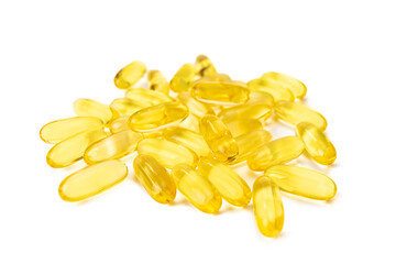 Pile of softgels capsules Omega 3 isolated on white background. Close up, top view, flat lay