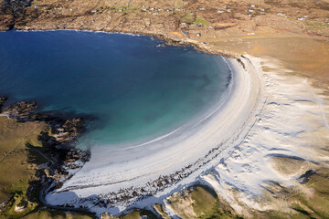 Aerial view on amazing Dog's bay beach near Roundstone town in county Galway, Sandy dunes and beach and blue turquoise color water. Cloudy sky. Popular travel destination. Gem of Connemara