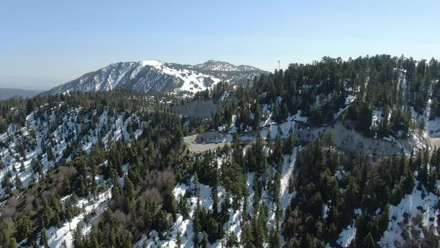 Winter Snow Forest Aerial Shot of San Bernardino Mountains Ski Trails Forward California USA