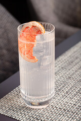 lemonade with grapefruit on the table, alcoholic drink and non-alcoholic