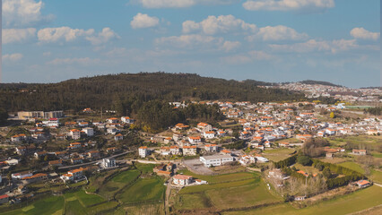 drone photography of fields and dense clouds