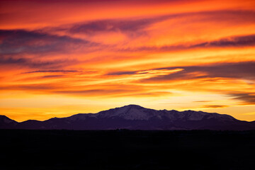 Snow Covered Mountain with Colorful Sunset