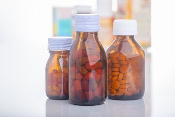 bottle of medicine onwhite background and no label bottle