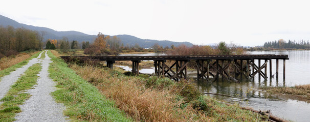 Old river pier for loading of the timber