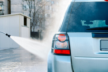 Car wash with pressure washer