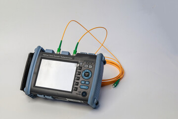 Professional testing of fiber optic connections OTDR meter. Measurement of the throughput of the...