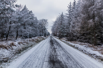 Fototapeta na wymiar Winter view of a road near Tisa, Czech Republic