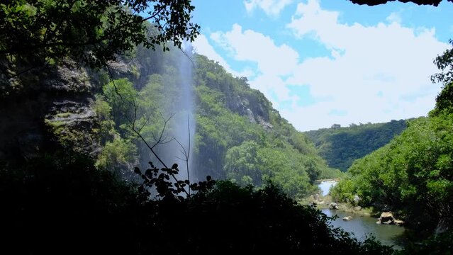 Behind the waterfall view at cascades in Mauritius