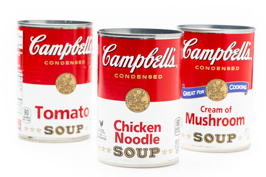 Los Angeles, CA/USA 6-21-2021: Three can tins of Campbell's brand tomato soup, chicken noodle soup and cream of mushrooms  soup