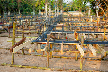 Building a house starts from making a structure from steel and wood.