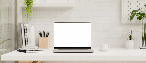 Fototapeta Modern white office working space with notebook laptop computer mockup obraz
