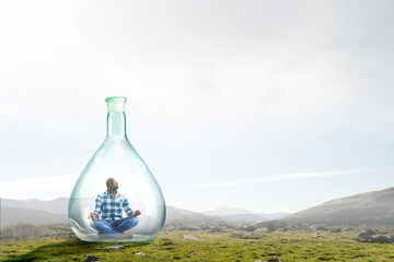 Young black man sitting and meditating