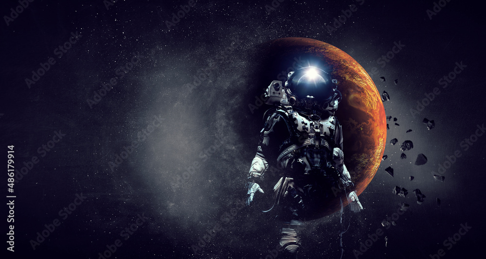 Wall mural astronaut and space exploration theme.
