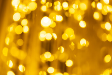 Abstract gold bokeh with black background with black background