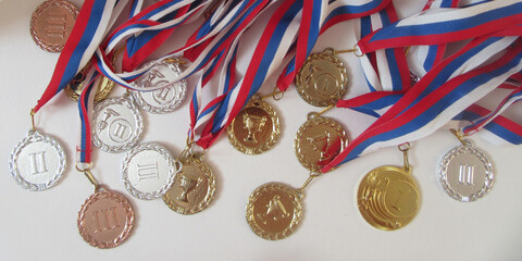 Gold , Silver and Bronze Medals with Ribbon on White Background - obrazy, fototapety, plakaty