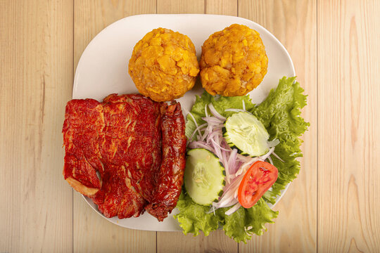 Tacacho with cecina, peruvian food. Photo above	