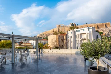 Fototapeten View from an empty outdoor terrace patio of the Parthenon and Acropolis Hill in Athens, Greece. © Kirk Fisher