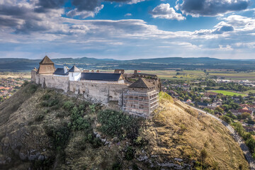 Aerial view of Sumeg castle with newly restored Gothic palace building and corner gun bastion under construction