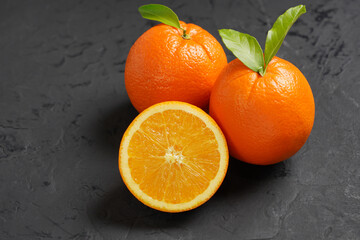 Fresh Orange fruit on black stone table background.Orange Fruit